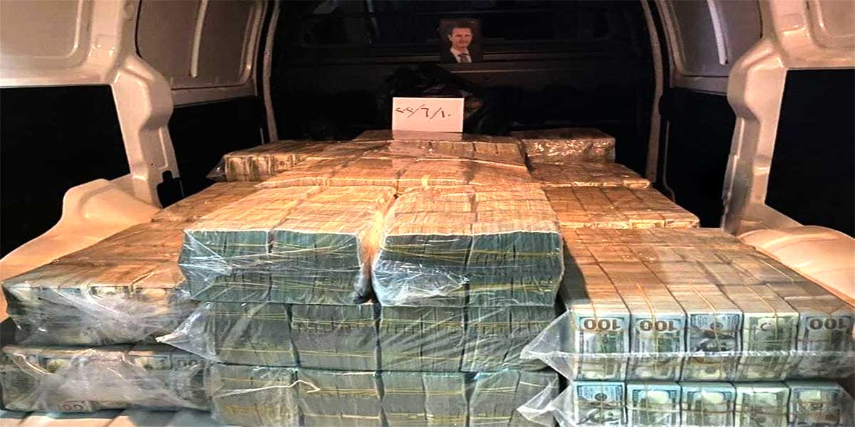 ملايين الدولارات بسيارة مع صورة بشار الاسد