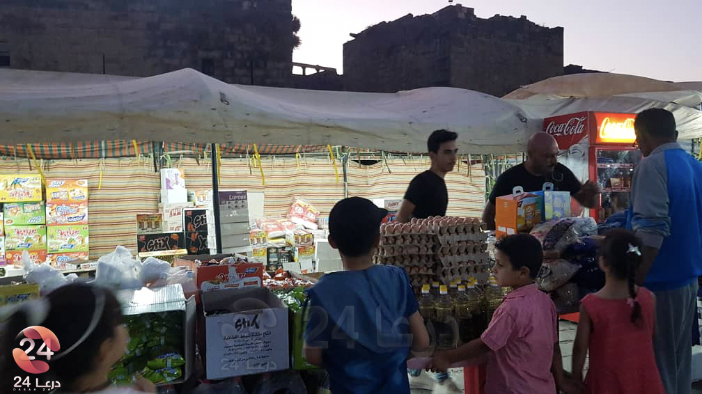مهرجان تسوق في ساحة قلعة بصرى الشام