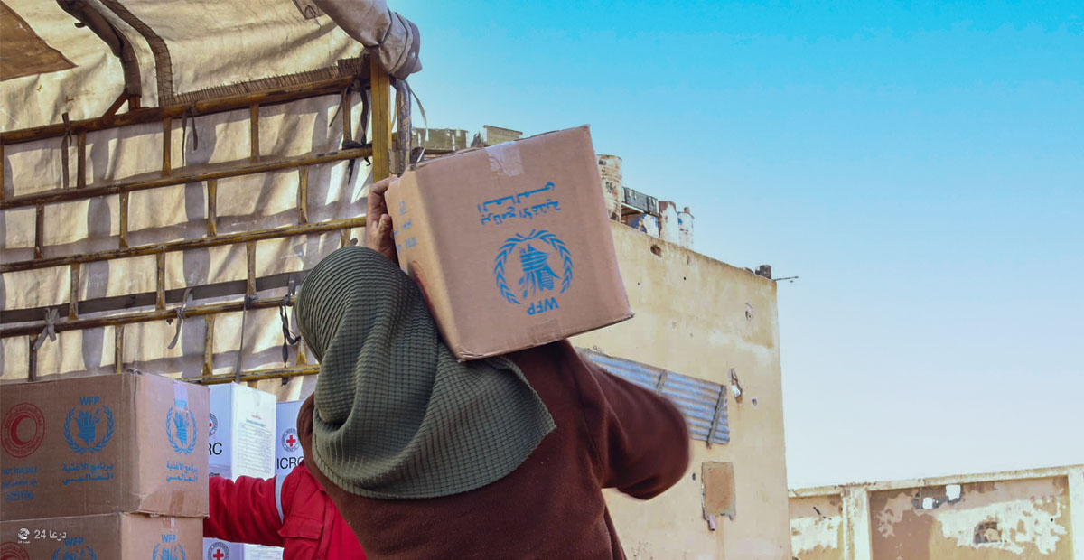 توزيع مساعدات- الهلال الأحمر درعا