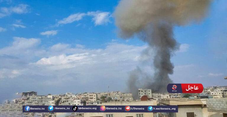 الدخان المتصاعد نتيجة تفجير عربة مفخخة في حي طريق السد