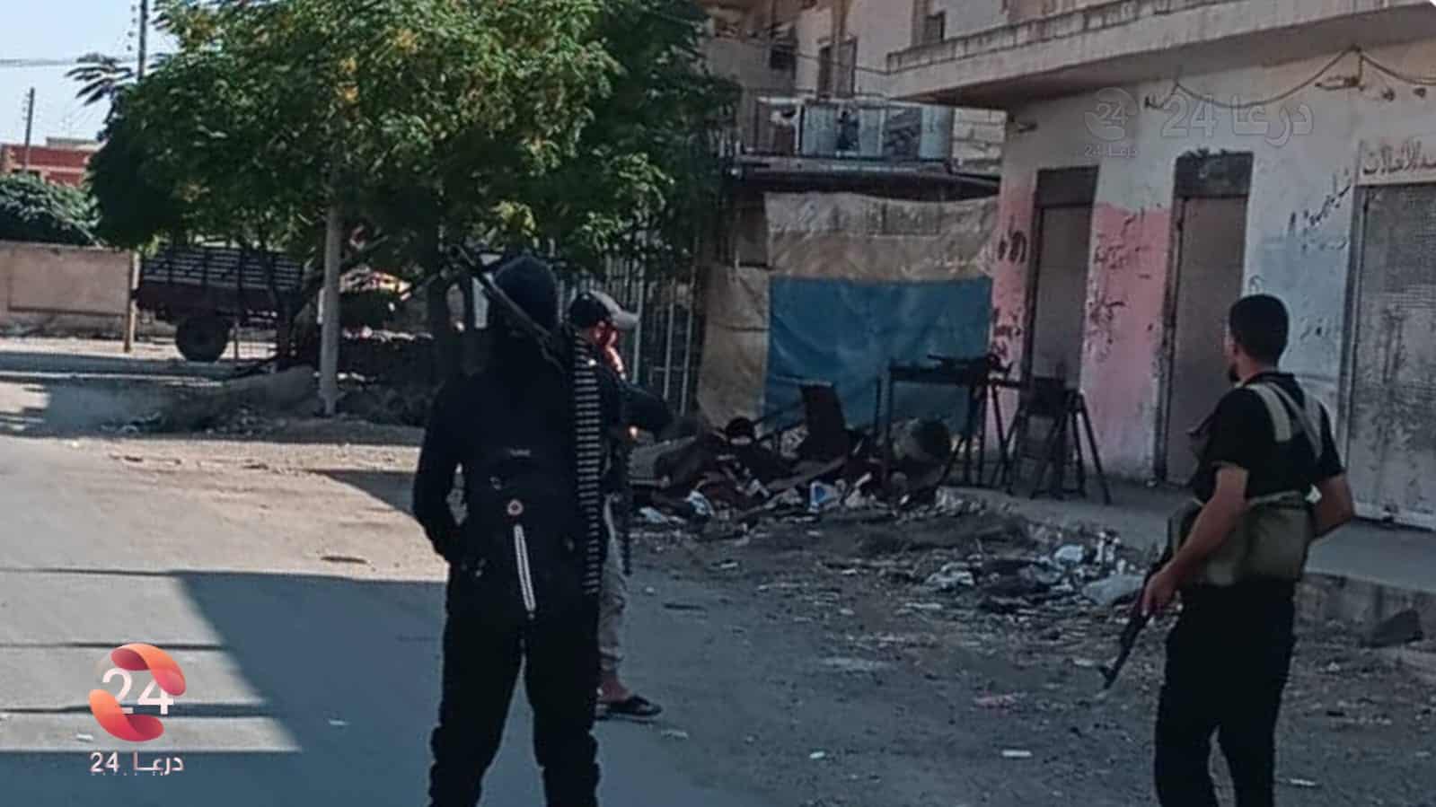صورة للمسلحين المحليين في بلدة محجة
