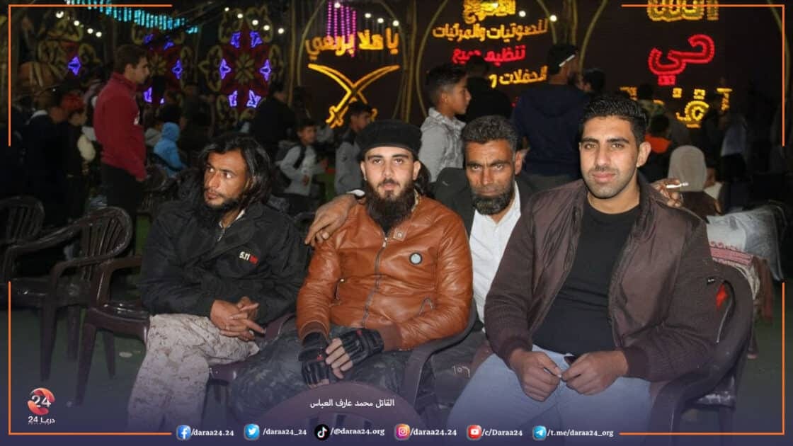 القاتل محمد عارف العباس في حفل زواج القيادي المحلي ابو علي اللحام في بلدة أم ولد