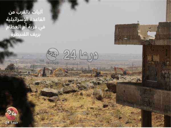 آليات في محيط قاعدة أم العظام